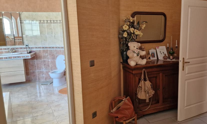 Rénovation complète : une maison transformée par le design et l’harmonie - Image avant 5
